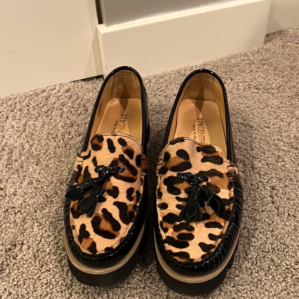 Super fun black parent leather and leopard loafer.